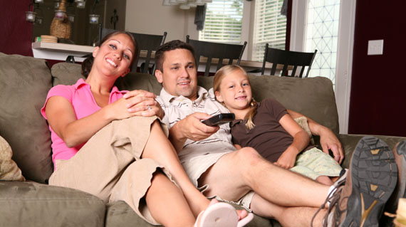 family enjoying cool ac on a summer day